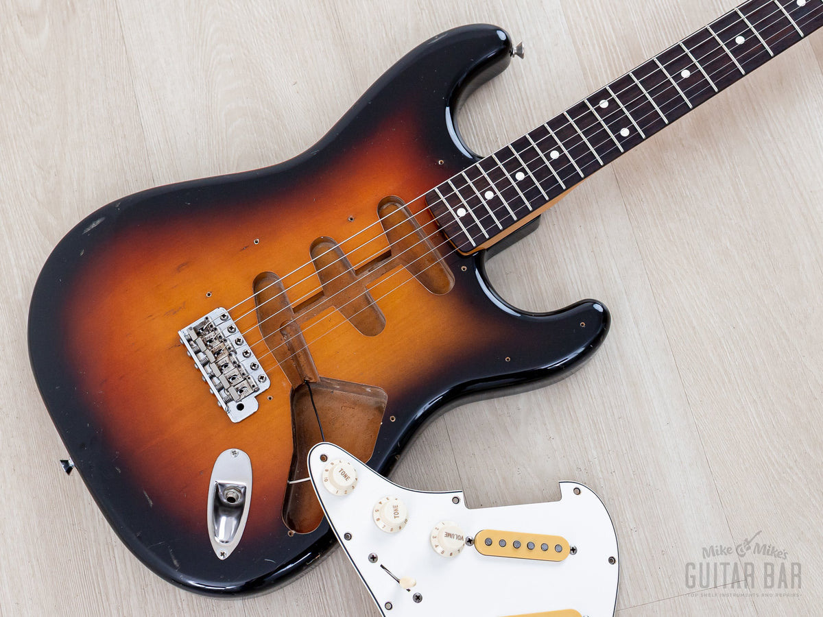 Pickguard lifted showing body routing