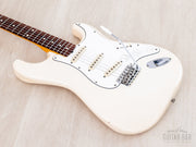 Body and neck angled from the treble side