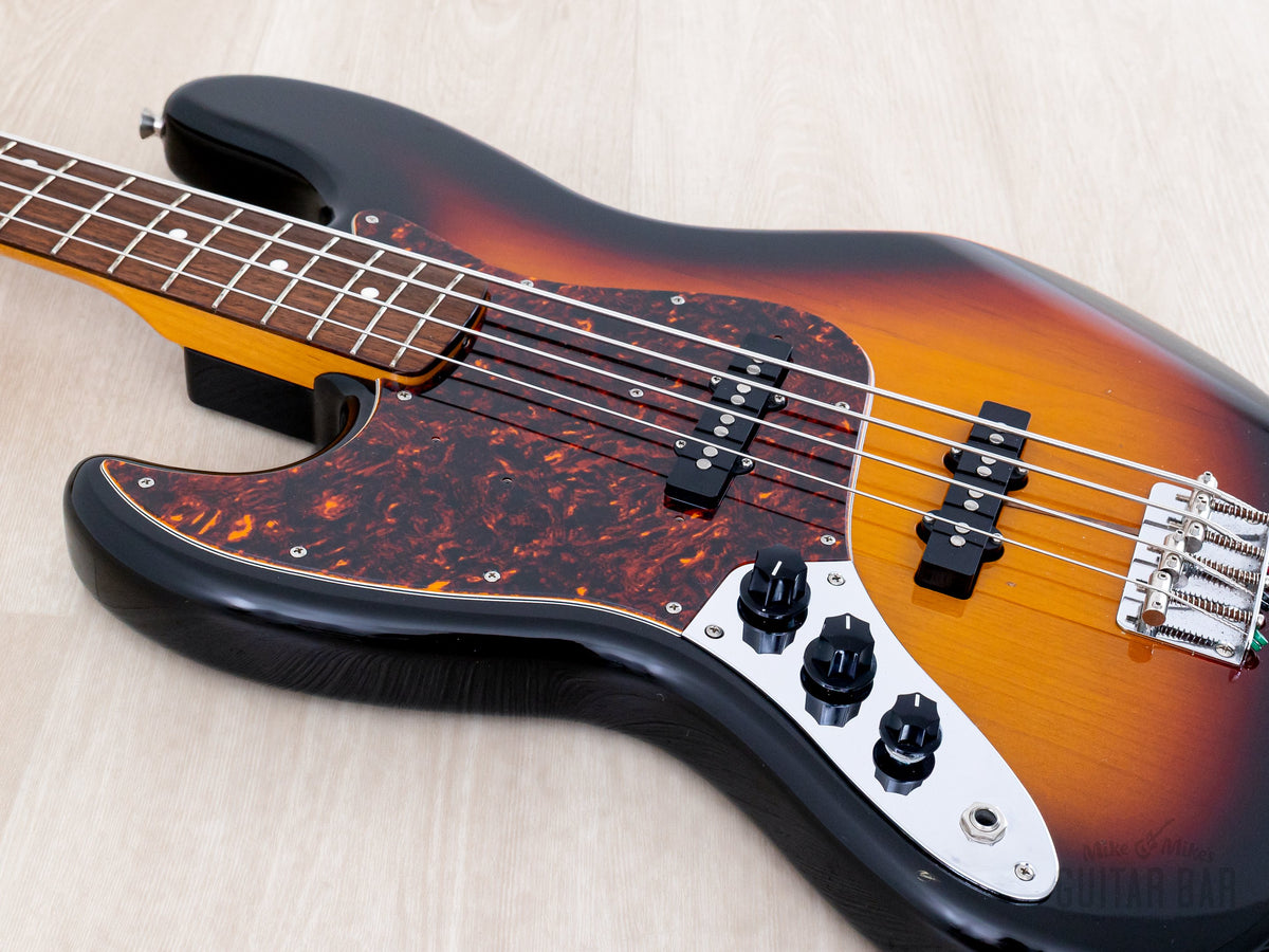 left-handed Fender Jazz Bass body and controls