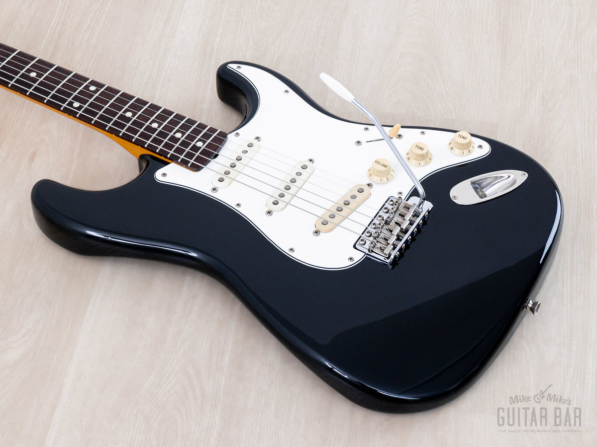 Body and neck angled from the treble side