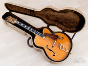 Carlo Greco archtop in open case with brown lining