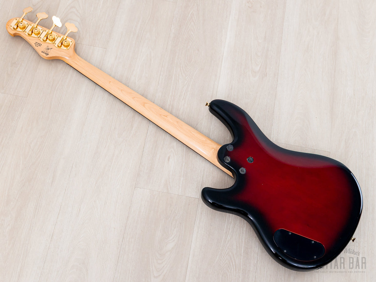 Back diagonal view showing maple neck and body back
