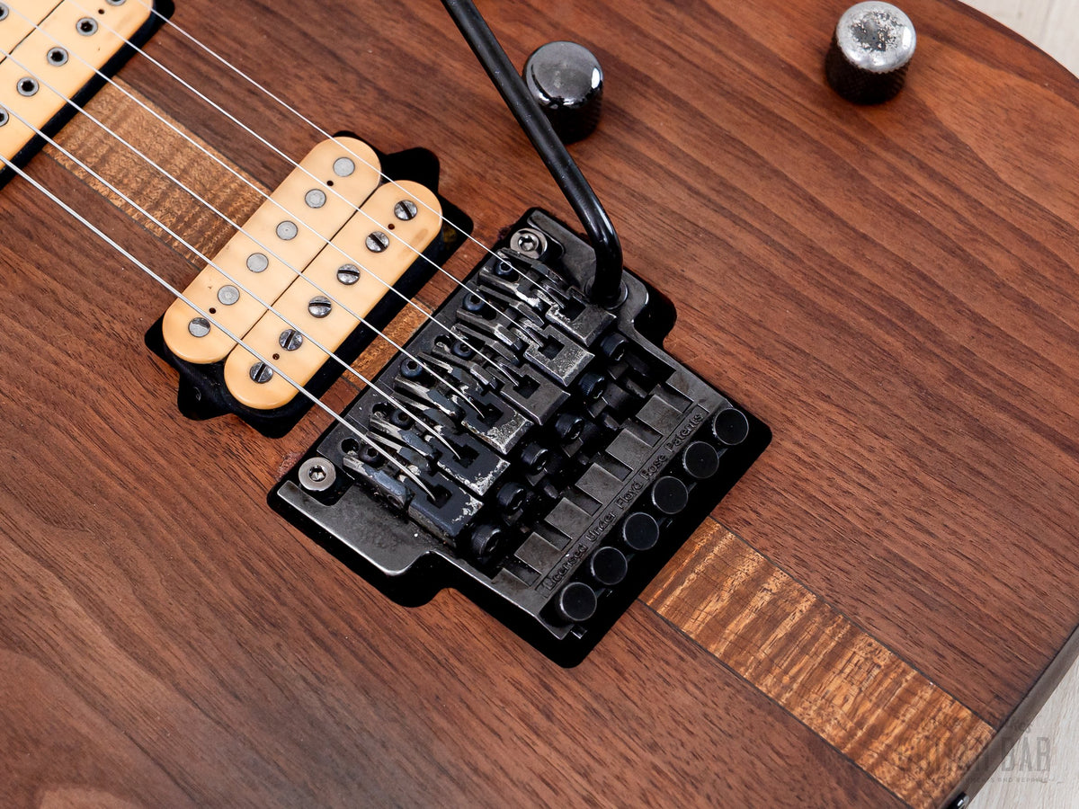 Bridge humbucker and flamed maple center strip close-up