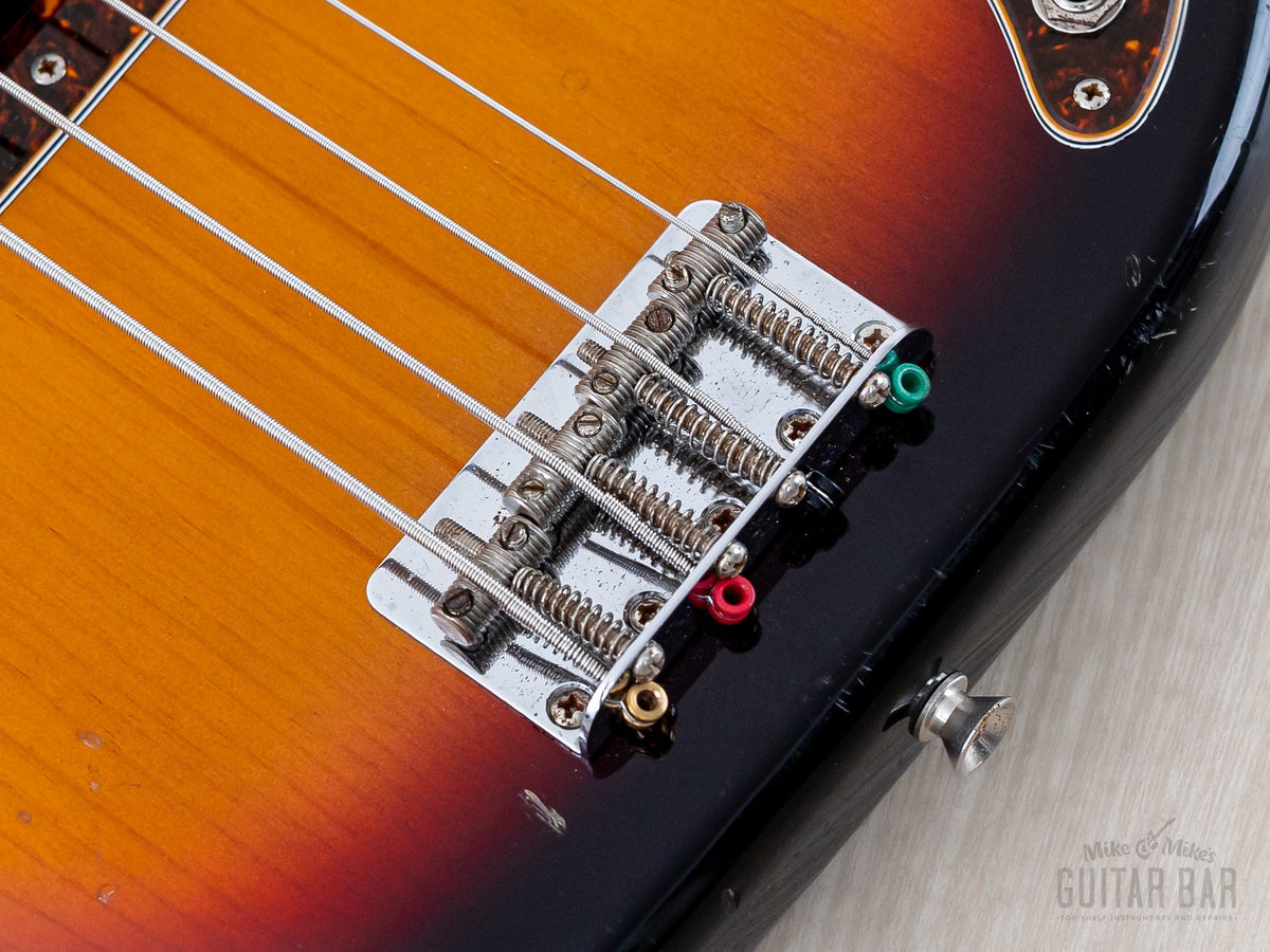 Close-up of four-saddle bridge with threaded saddles