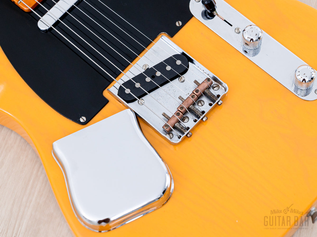 1999 Fender American Vintage 52 Telecaster Butterscotch, bridge with brass saddles close-up