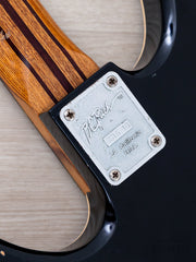 Warlock Bass neck plate and laminate neck close-up