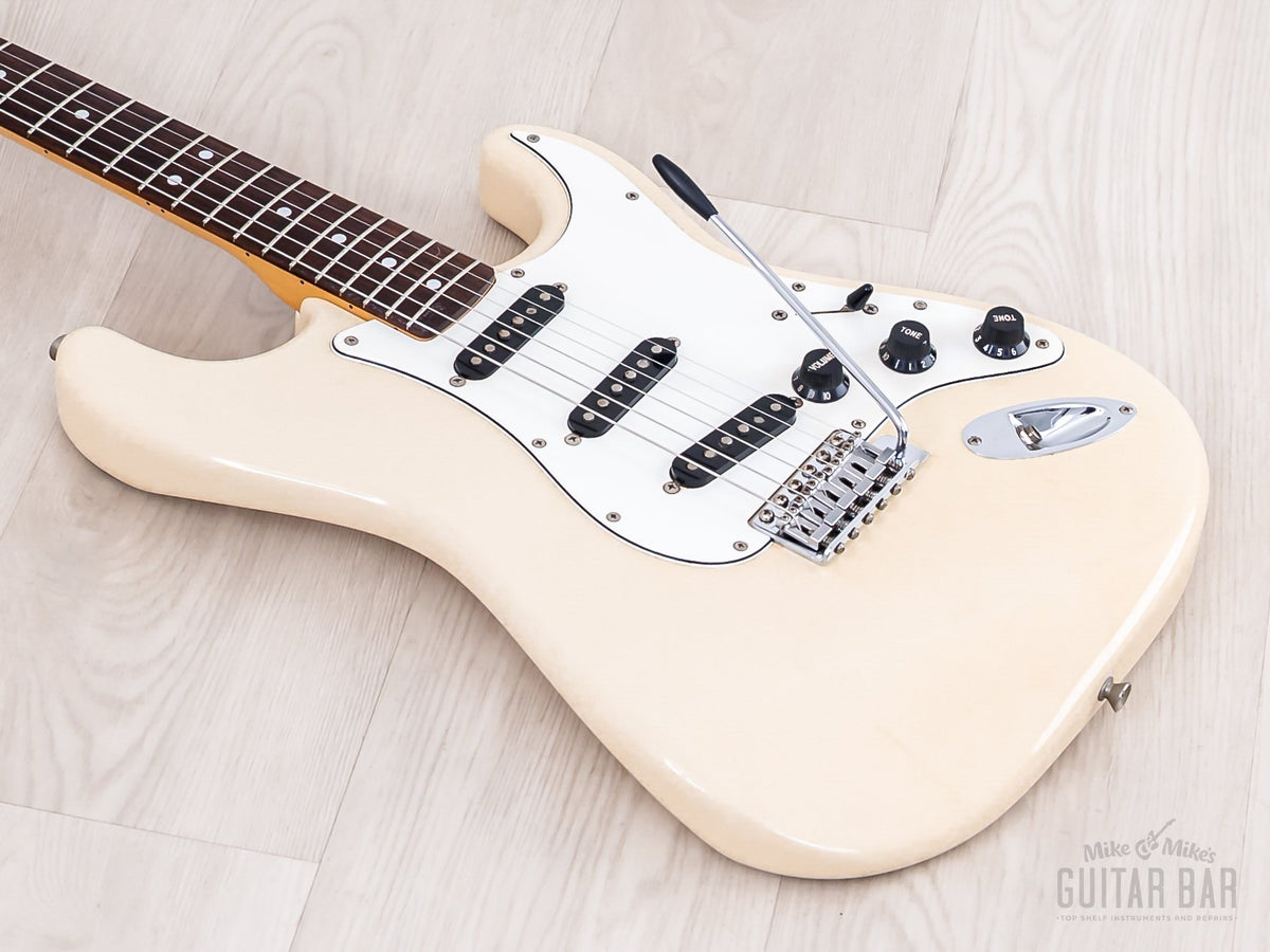 Body and neck angled from the treble side