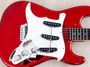 Pickguard lifted showing pickups and wiring