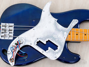 Pickguard lifted, showing underside and pickup wiring