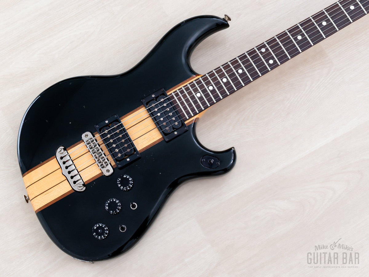 1980 Aria Pro II RS-600H black body with maple/walnut neck-through stripe, angled view