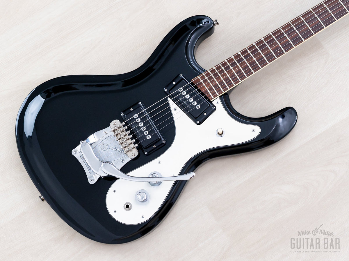 Firstman Mosrite Ventures Model black body with Moseley vibrato, angled view