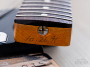 Neck heel with pencil date
