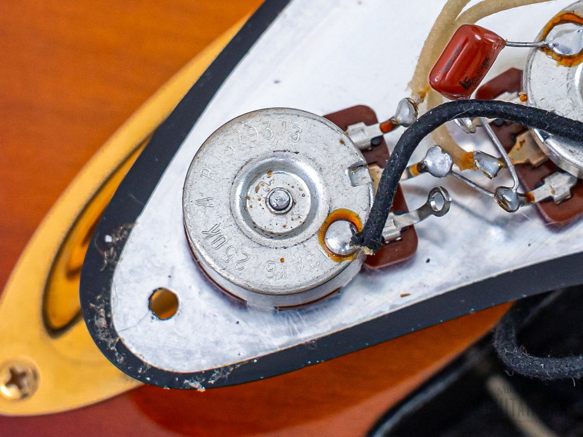 Close-up of CTS pots and untouched solder
