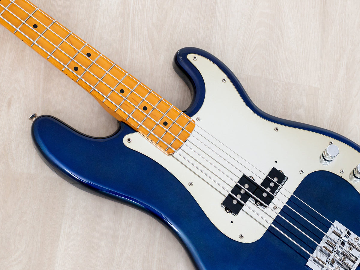 Close-up of pickguard, pickup and knurled knobs