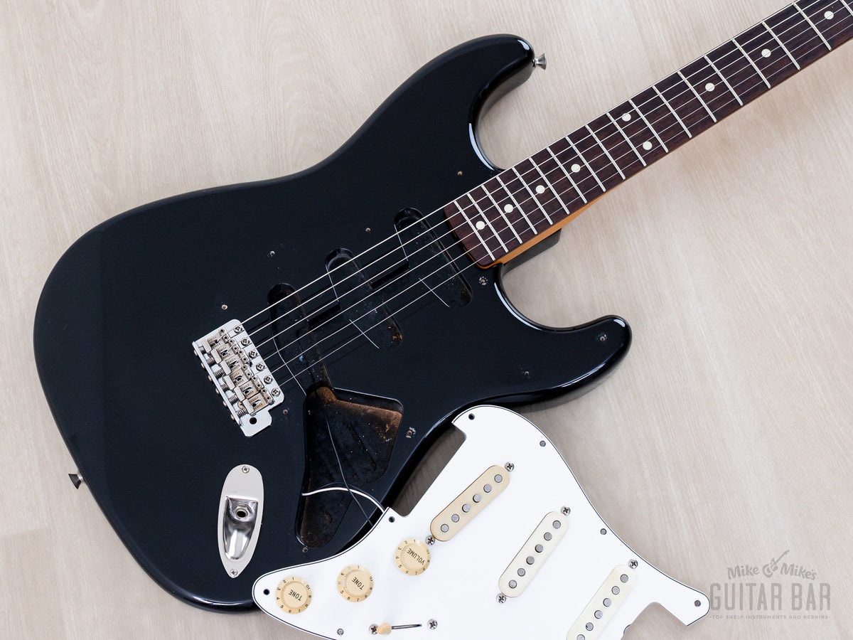 Pickguard lifted showing body routing