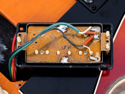 Yamaha SG1000 humbucker baseplate date stamp close-up