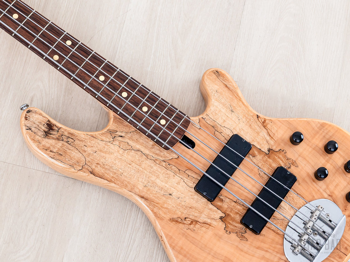 Close-up of spalted maple top and two soapbar pickups