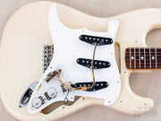 Pickguard lifted showing pickups and wiring