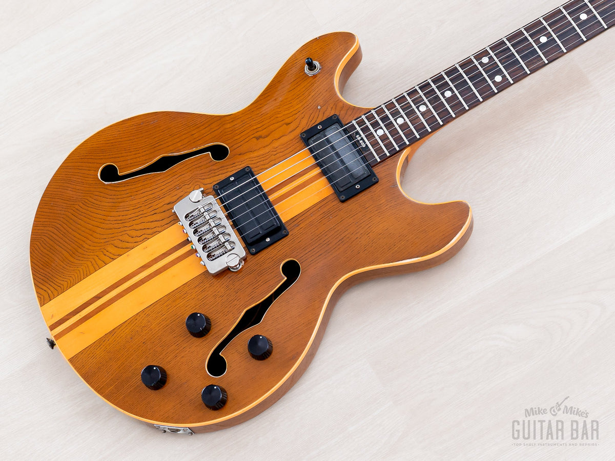 1980 Aria Pro II SH-800 oak semi-hollow body with neck-through stripe, angled view