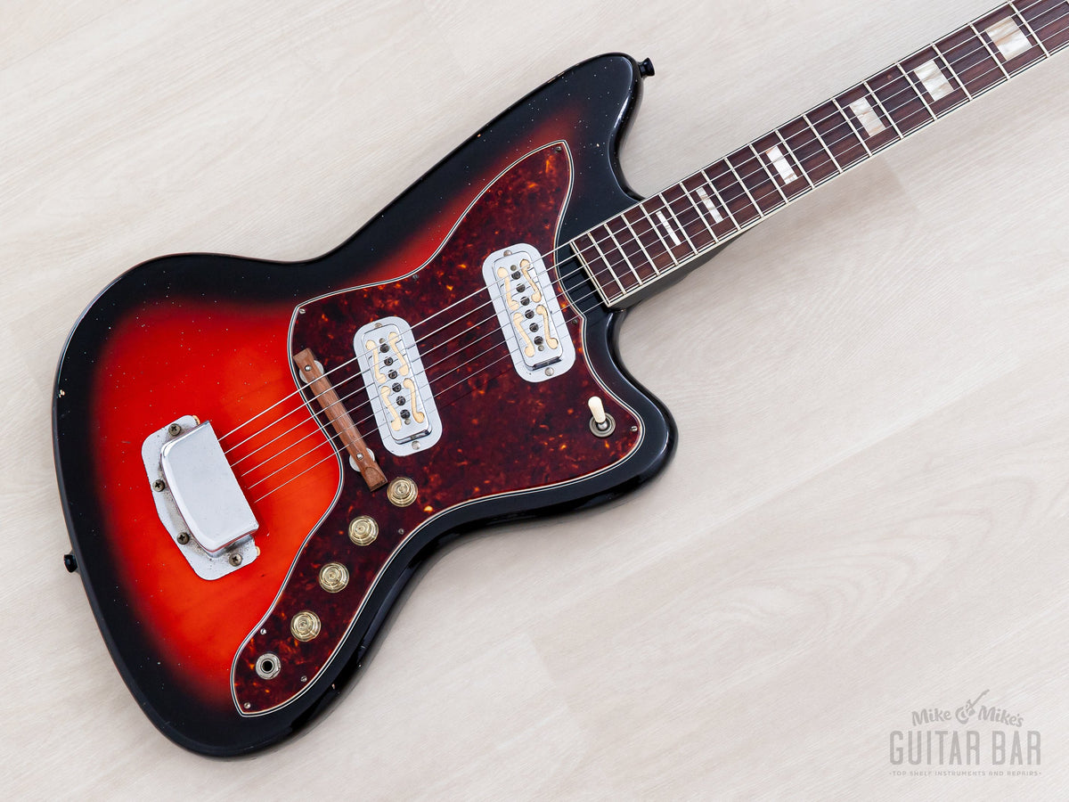 1965 Harmony Holiday Silhouette red sunburst body with tortoise pickguard, angled view