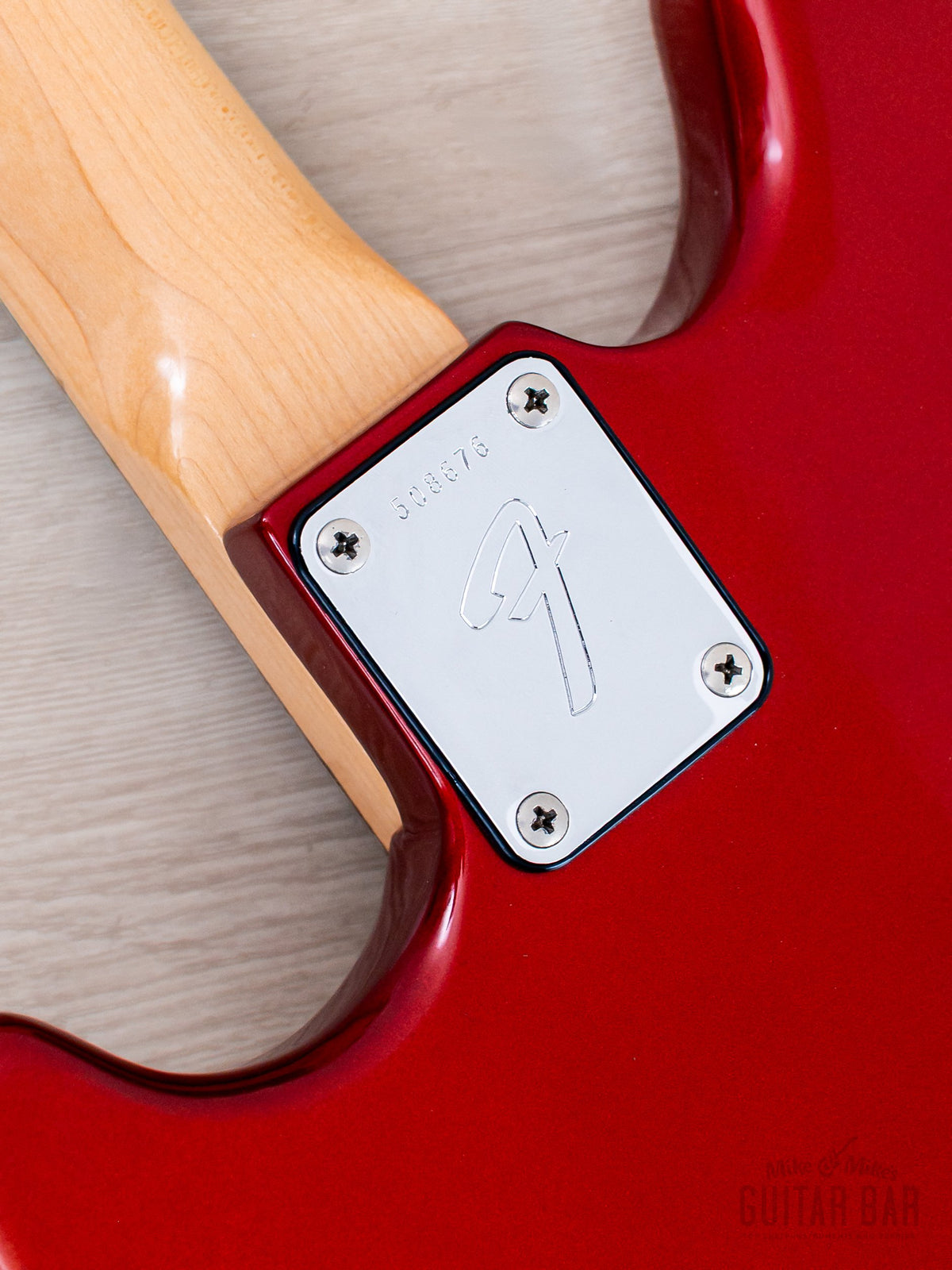 F-stamped neck plate close-up