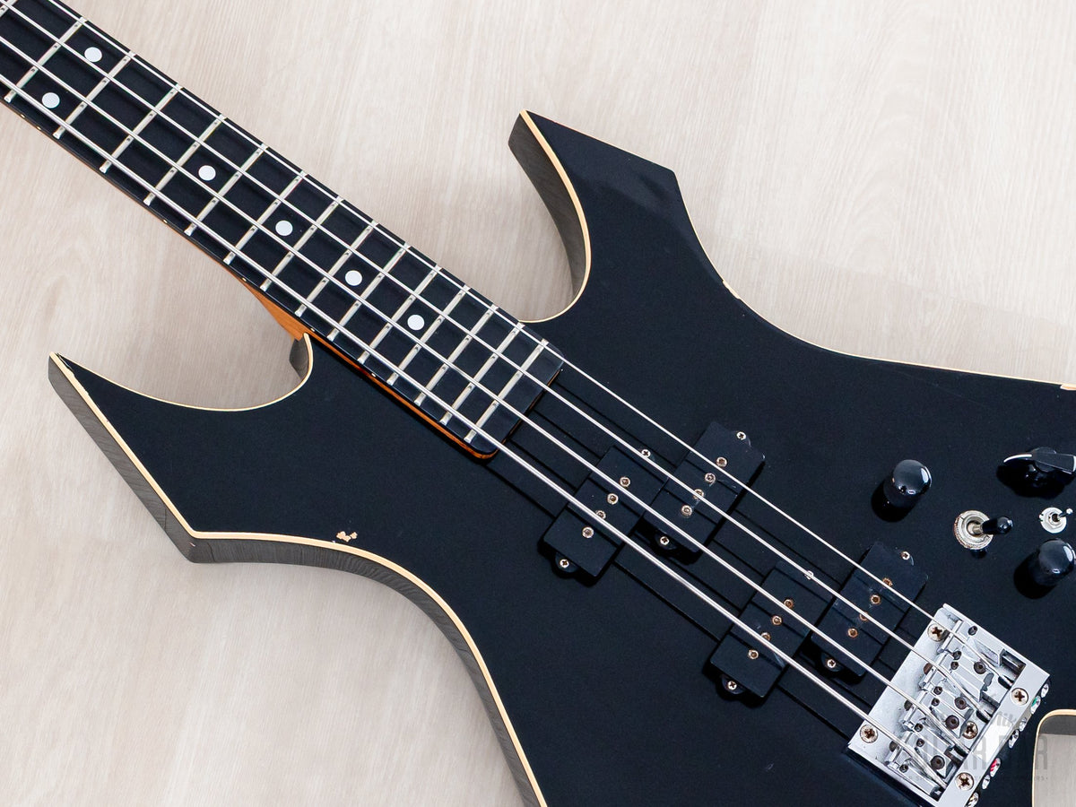 Warlock Bass bound black body and fretboard, angled