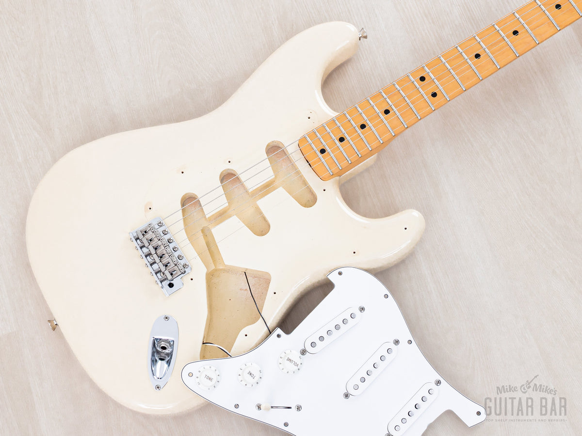 Pickguard lifted showing body routing