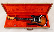 Guitar in open original tweed hardshell case