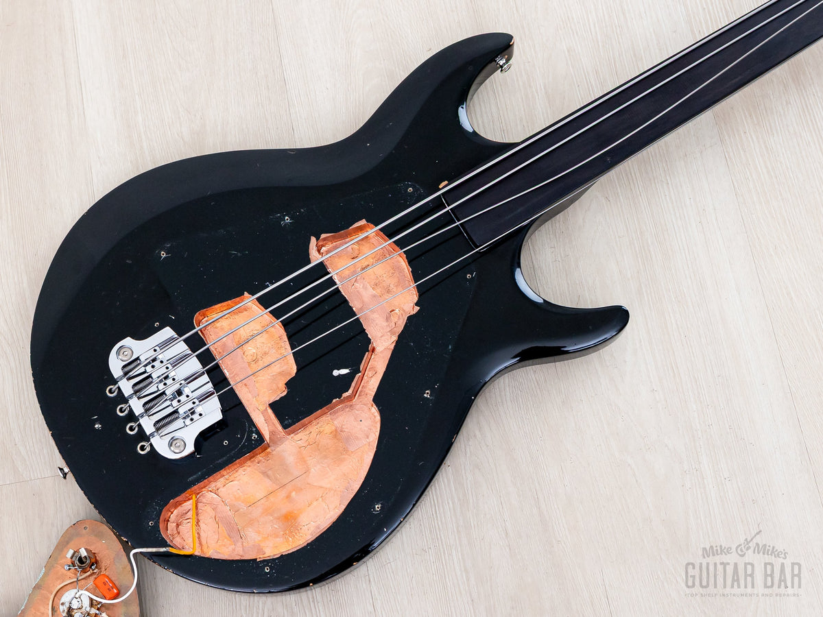 Ripper body route with the copper-shielded pickguard lifted