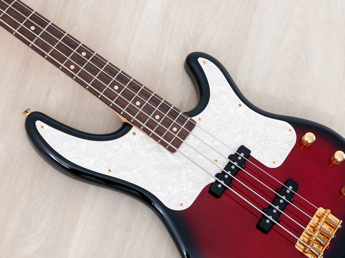 Close-up of pearloid pickguard and pickups