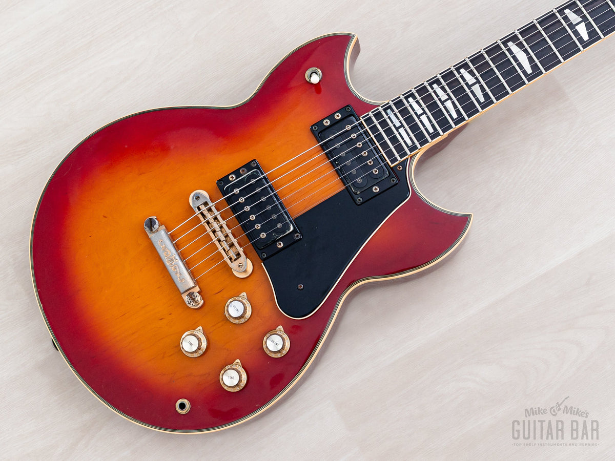 1981 Yamaha SG1000 Red Sunburst body, angled front view