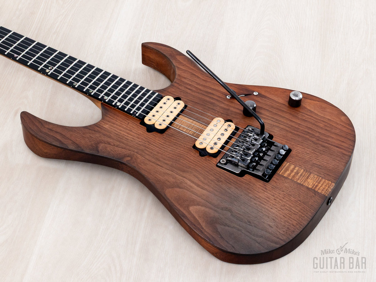 Body and neck angled from the treble side