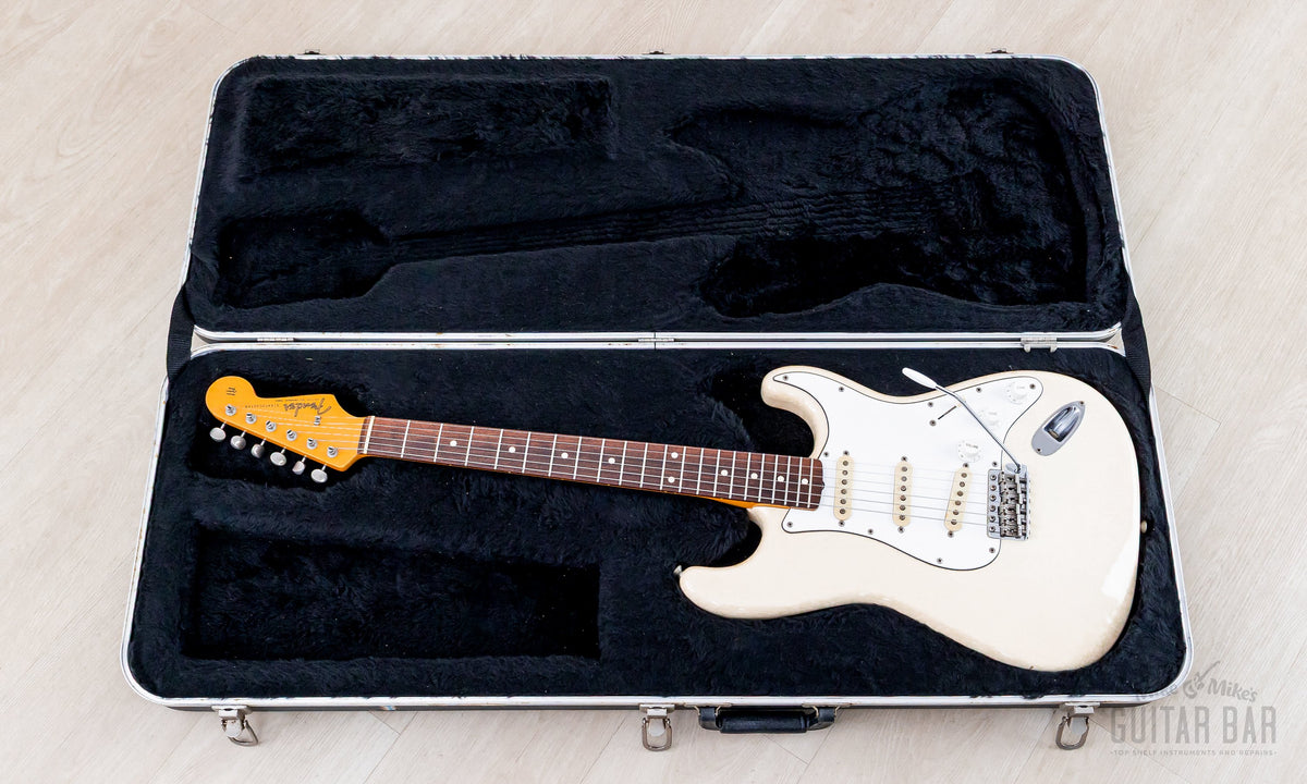 Guitar in the open Fender molded case