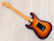 Back diagonal view showing maple neck and tremolo cover