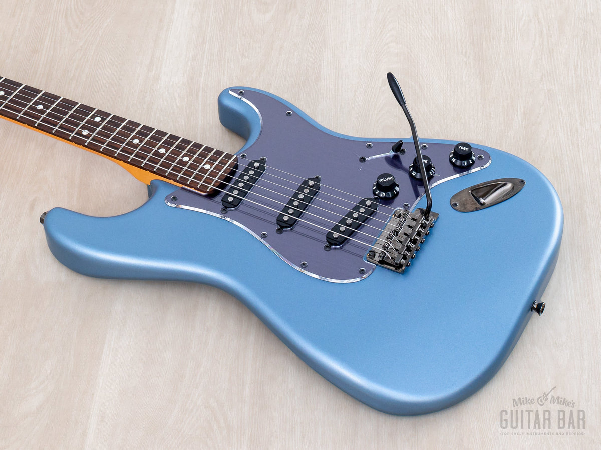 Body and neck angled from the treble side