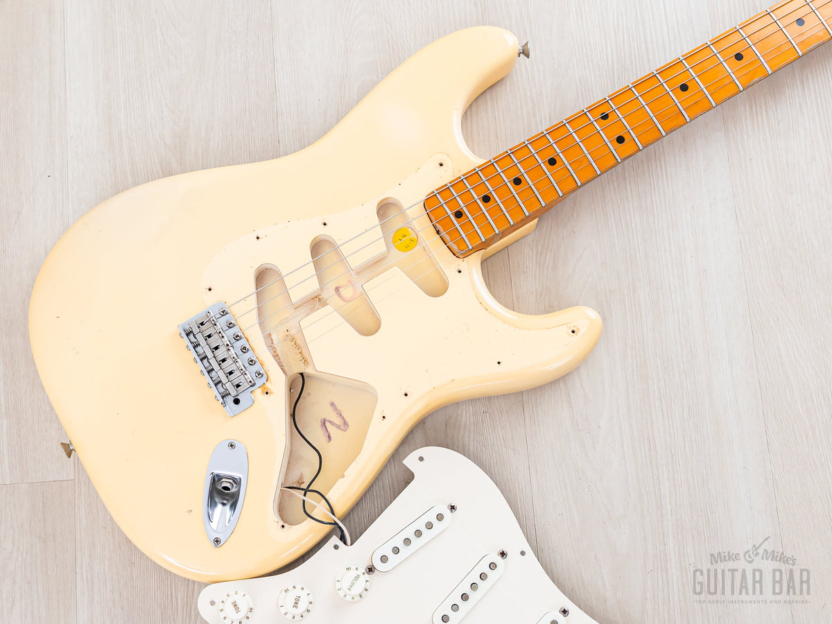 Pickguard lifted showing body routing