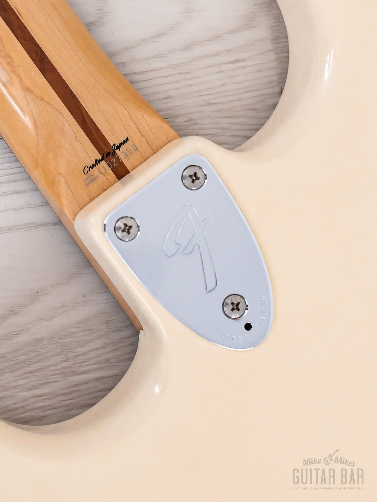Three-bolt neck plate close-up