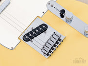 1988 Fender American Standard Telecaster Vintage White, bridge pickup and six-saddle bridge close-up