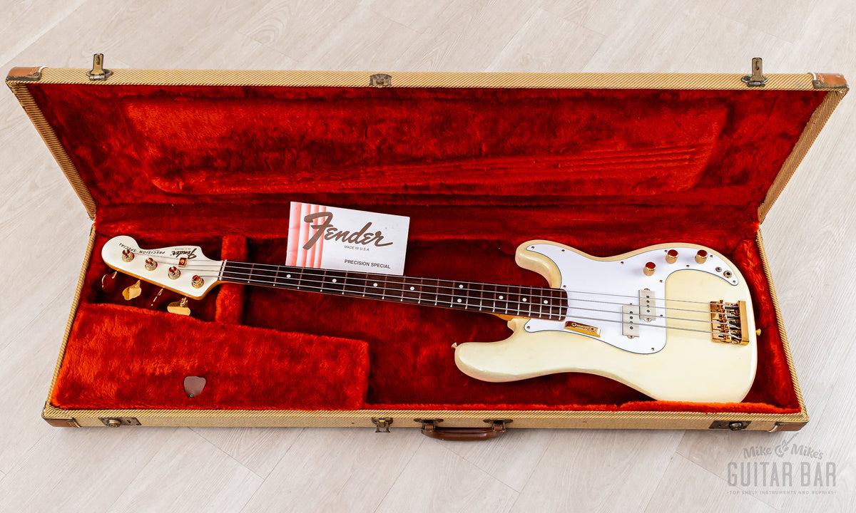 Bass in original tweed hardshell case with red interior