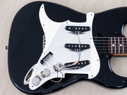 Pickguard lifted showing pickups and wiring