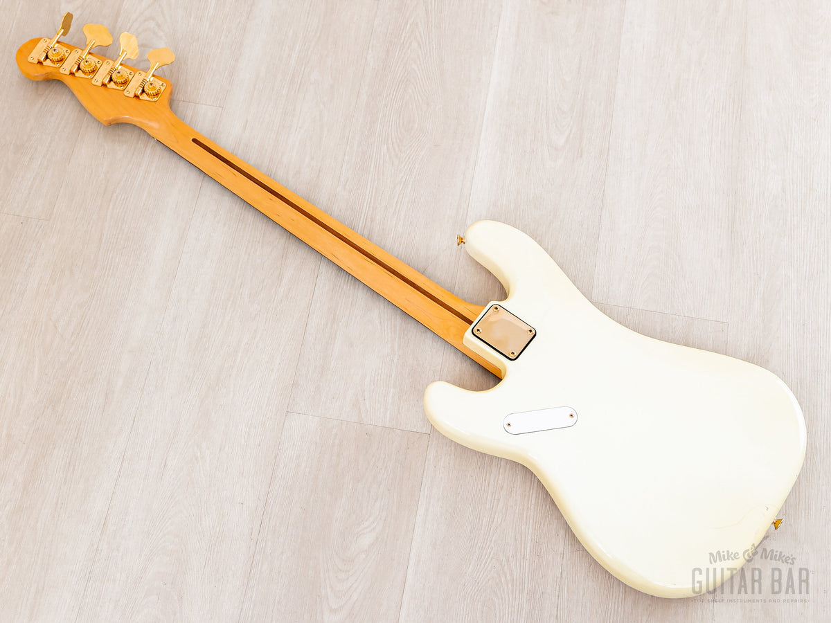 Back diagonal view showing maple neck and body back