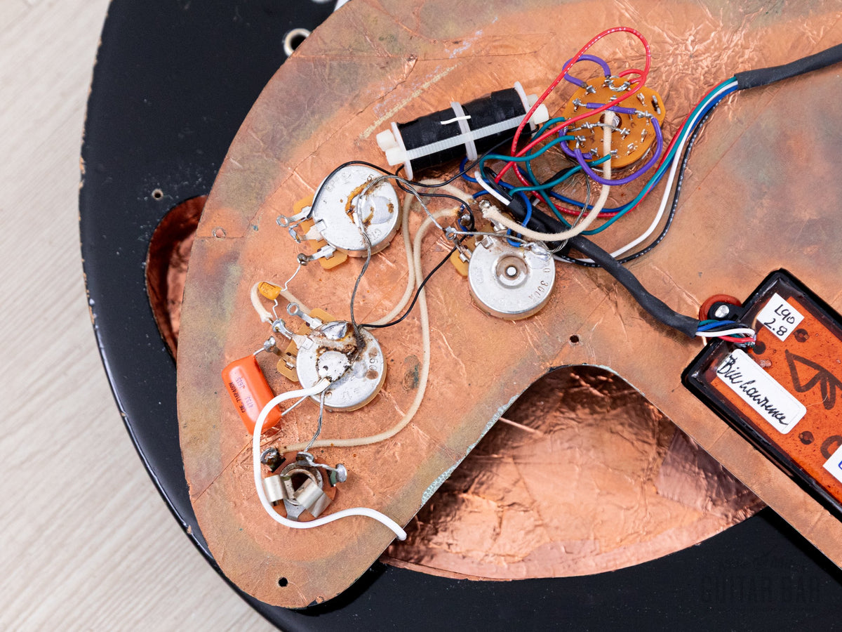Close-up of the Ripper pots and wiring under the pickguard