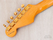 Back of headstock with gold vintage-style tuners